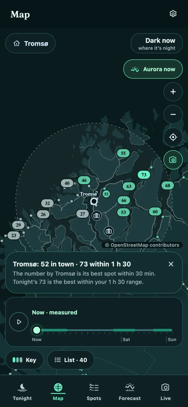 Map of scored viewing spots around Tromsø inside a 1 hour 30 minute driving range, with camera markers